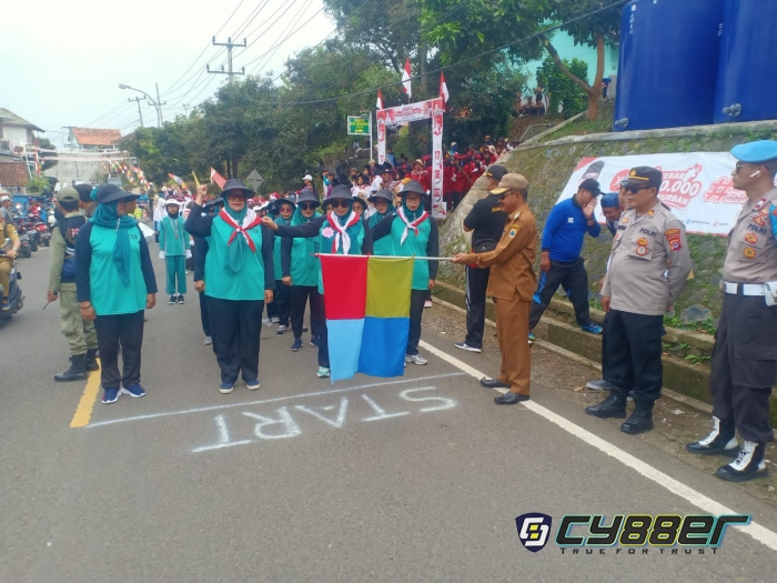 Personil Polsek Cilograng Polres Lebak, Laksanakan Pengamanan Lomba Gerak Jalan Peringatan HUT RI ke 77