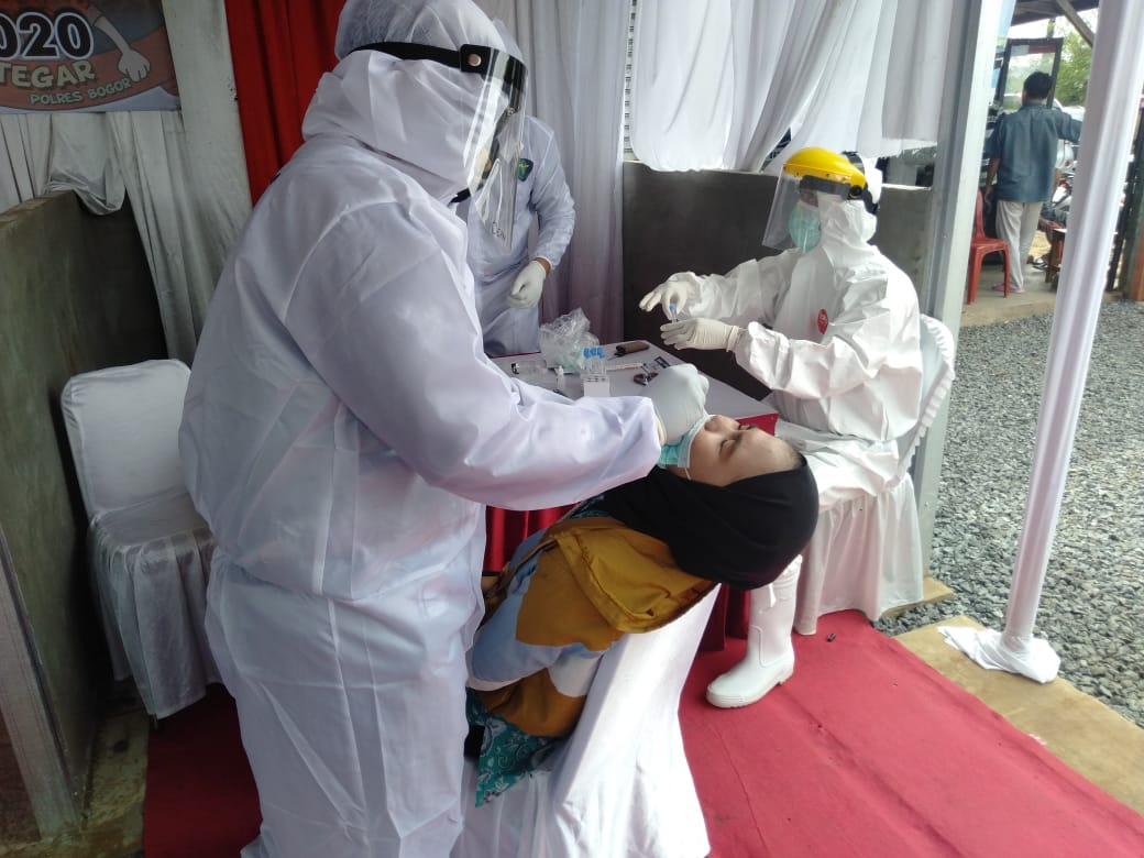 Polres Bogor Polda Jabar  Gelar Rapid Antigen di Jalur Alternatif Jonggol - Cariu