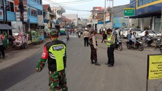 Cegah Covid-19, Polresta Bandung Polda Jabar Laksanakan Ops Yustisi dan Bagikan Masker Gratis di Rancaekek