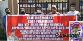 Tak Puas Dengan Gaji Polisi, Oknum Anggota Polresta Pekanbaru FR Diduga Nyambi Jadi Koordinator Parkir di Jalan Riau