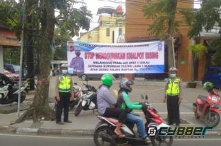 Polisi Pasang Spanduk Larangan Penggunaan Knalpot Bising