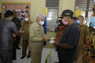 Bupati Asahan Salurkan Bantuan Kepada Kaum Dhuafa