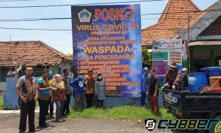 Cegah Covid-19, Pemdes Pandanan Lakukan Penyemprotan Disinfektan