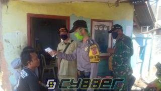 Antisipasi Covid-19 Polsek Kandanghaur Cek Suhu Badan Pada Warga Yang Baru Datang