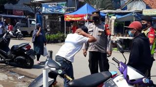 Polsek Cileunyi Gelar Ops PPKM Gaktiblin Prokes di Pasar Tumpah Bumi Harapan
